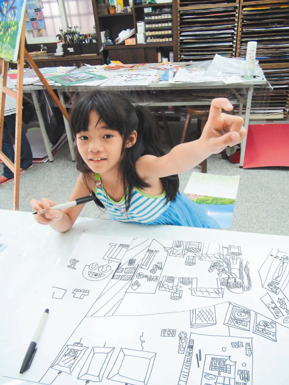 她7歲 開畫展