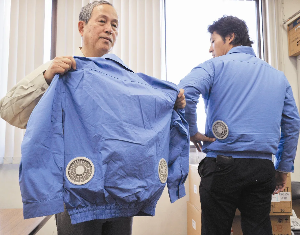 Air-conditioned jackets help Japan beat heat空調夾克 幫助日本擊退熱浪