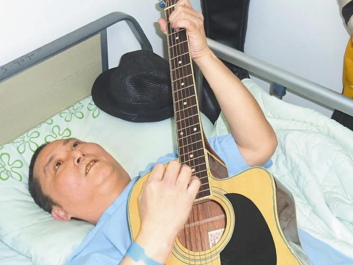 半身癱瘓 他唱出生命之歌