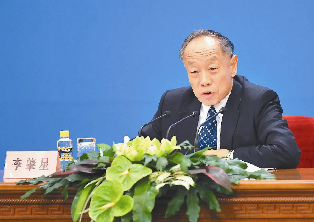 表情多擅機鋒  李肇星真逗