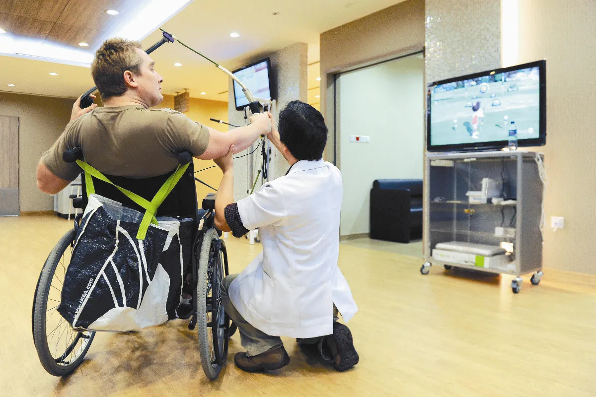 Greying Singapore taps robots, games in rehab
