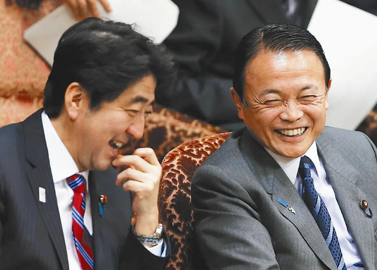 迫就範 安倍揚言修改日銀法
