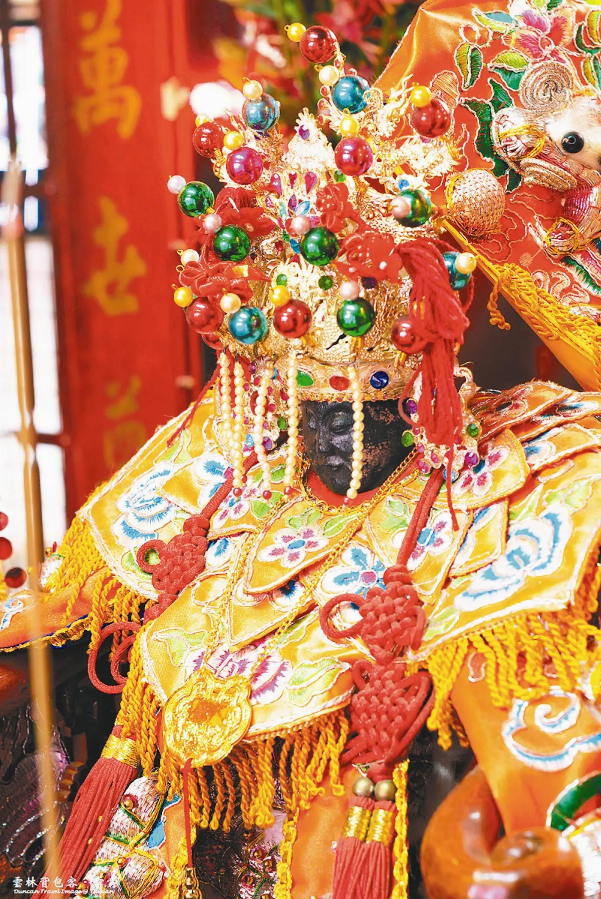 土地婆避居20年 周六金衣回駕