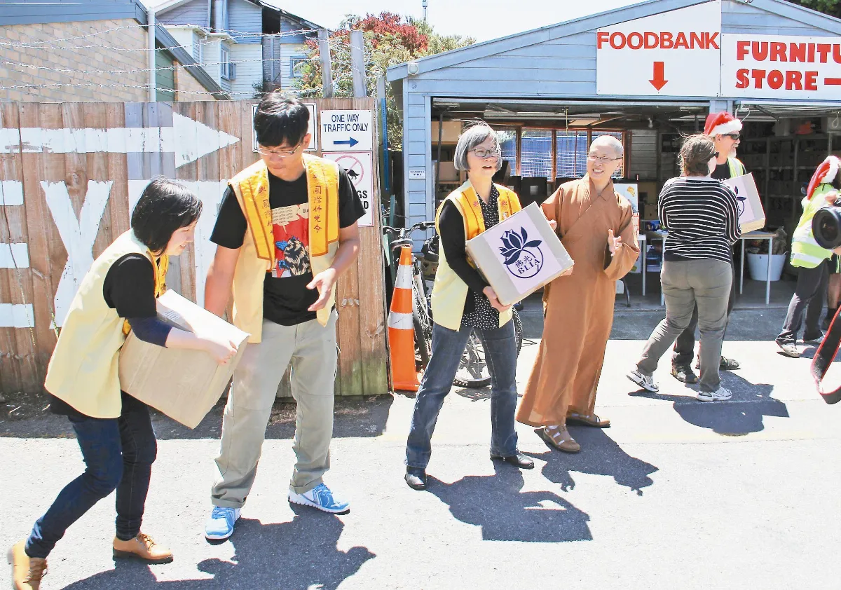 紐南島送暖 助弱勢度耶節