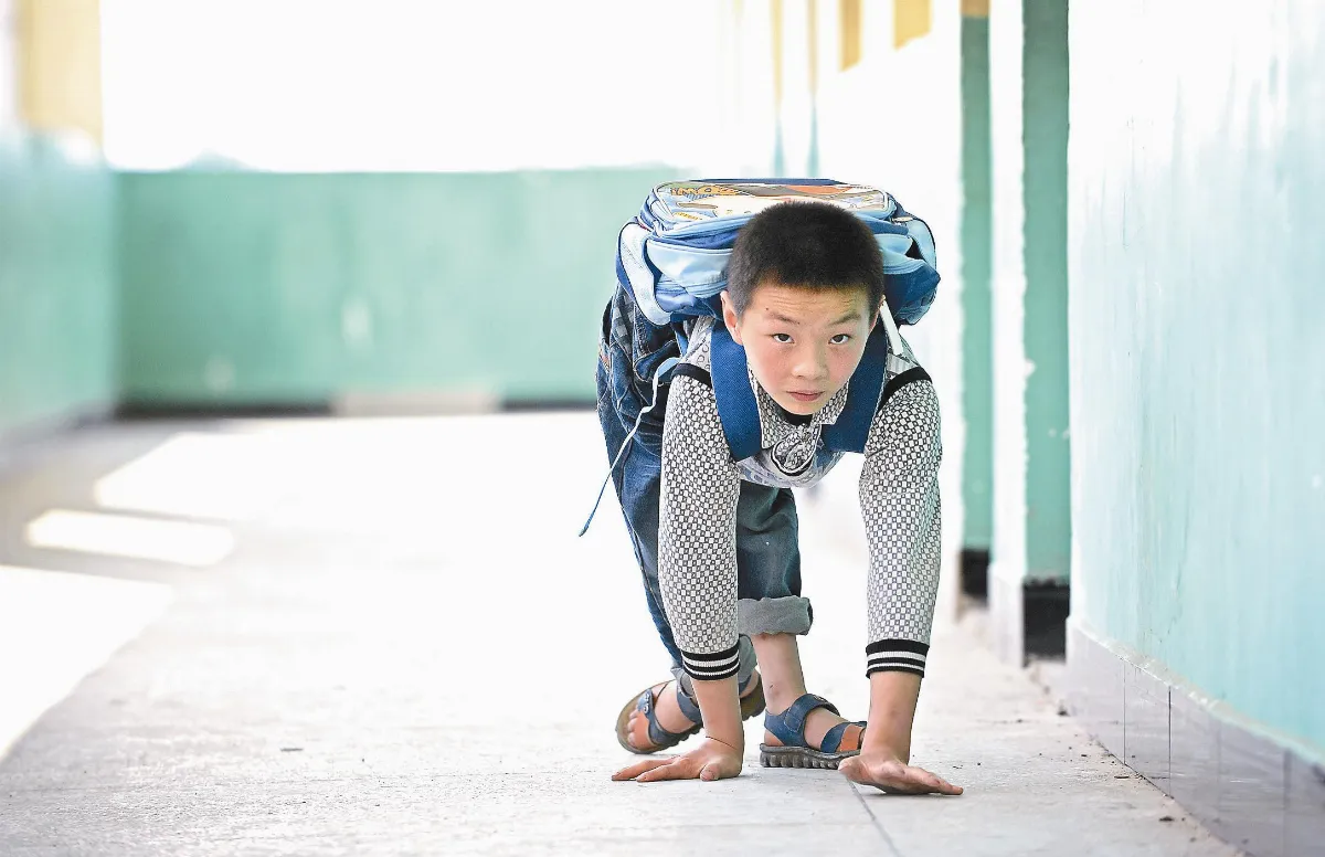 蝸牛男孩 艱辛向學