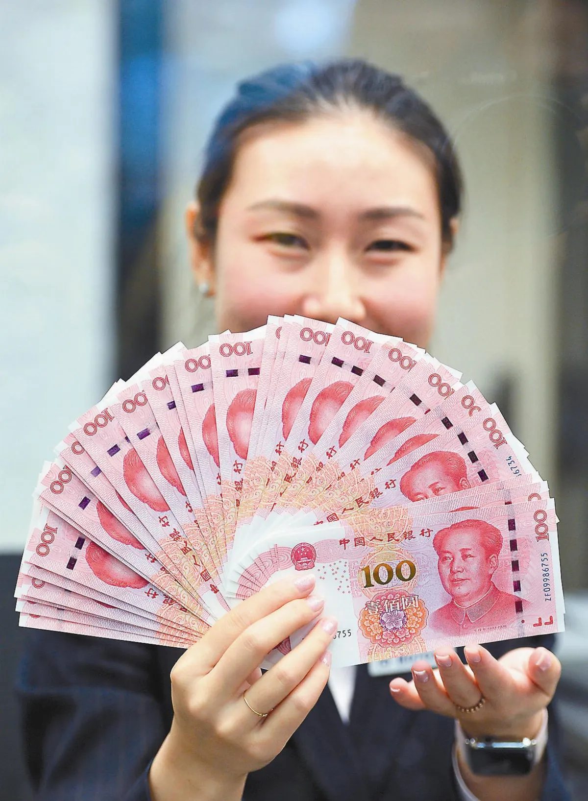 土豪金人民幣 民眾清早搶換
