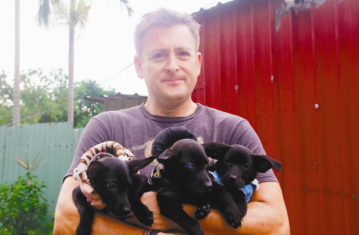 洛城主管 學佛行善 老美佛雷德來台 賣屋照顧流浪狗