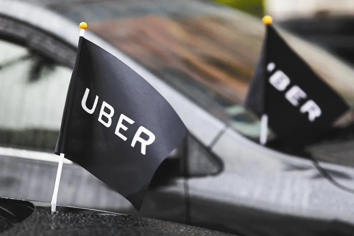 與租賃車、計程車業者合作  Uber  重返台灣…沒找自用車駕駛