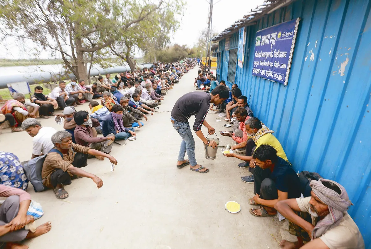 沒錢搶購  窮人危機 沒染病先餓死