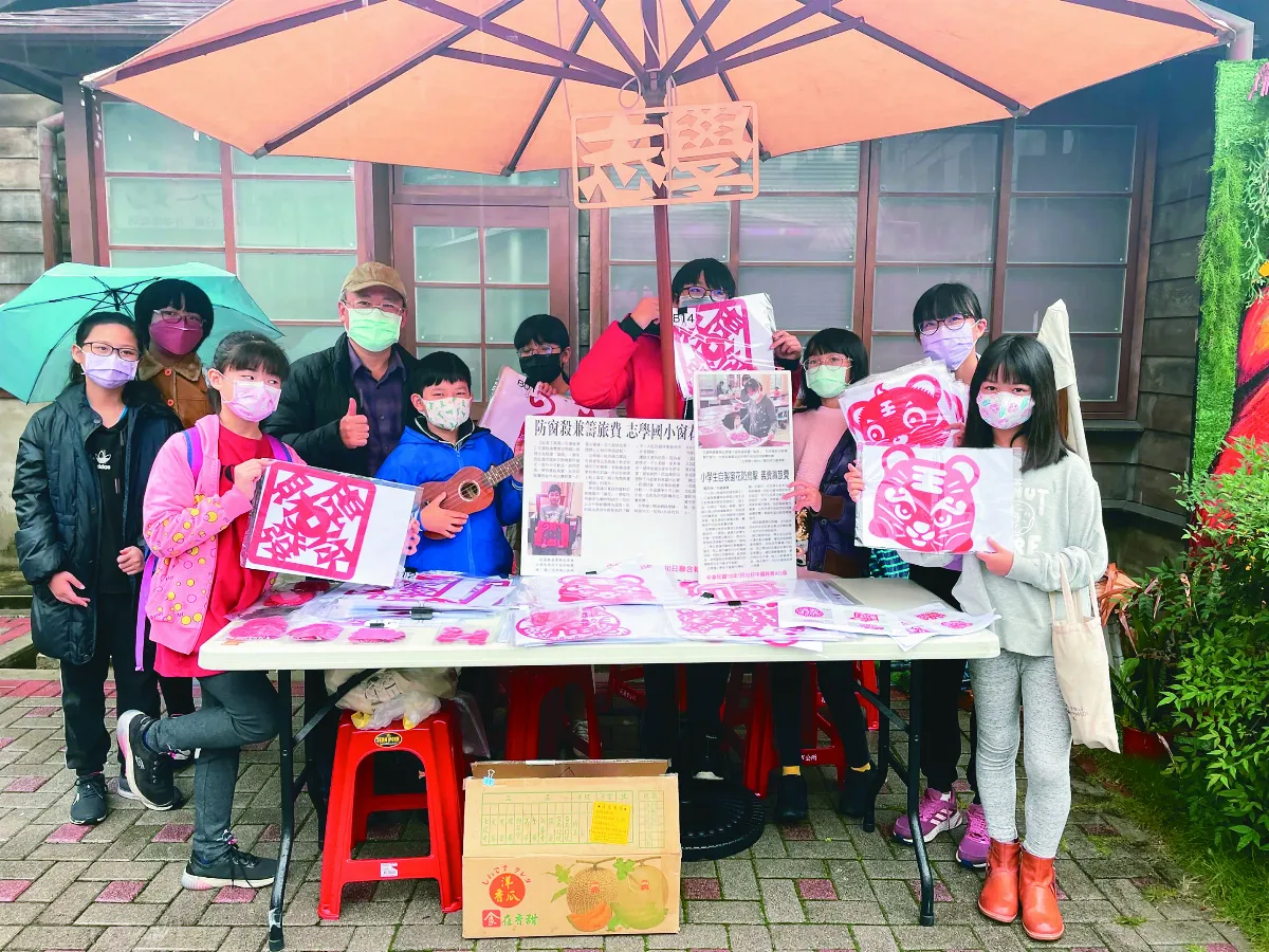 義賣虎年窗花 護鳥助田徑隊