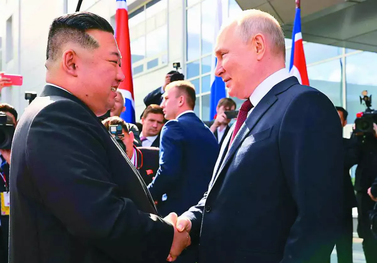 普亭晤金正恩 允助平壤造衛星
