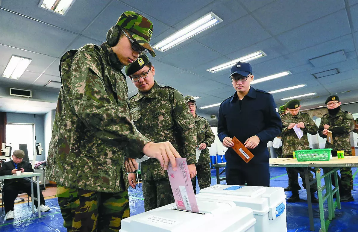 社論--選舉權與不在籍投票