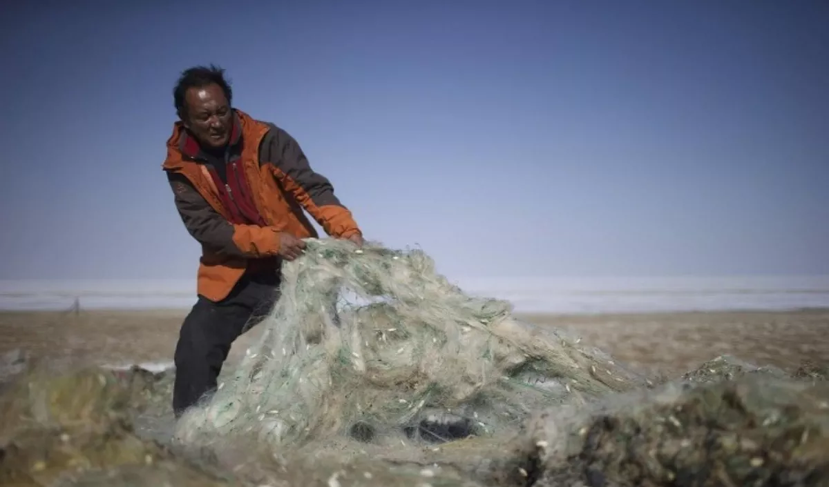 環保版愚公 30年移走垃圾山