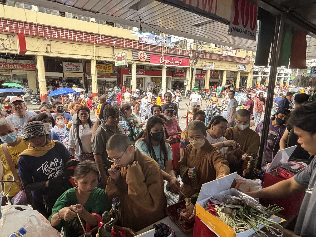 Buddha Bathing Event in Quiapo, Manila, Philippines Draws Thousands, Locally Supported by Enthusiastic Businesses