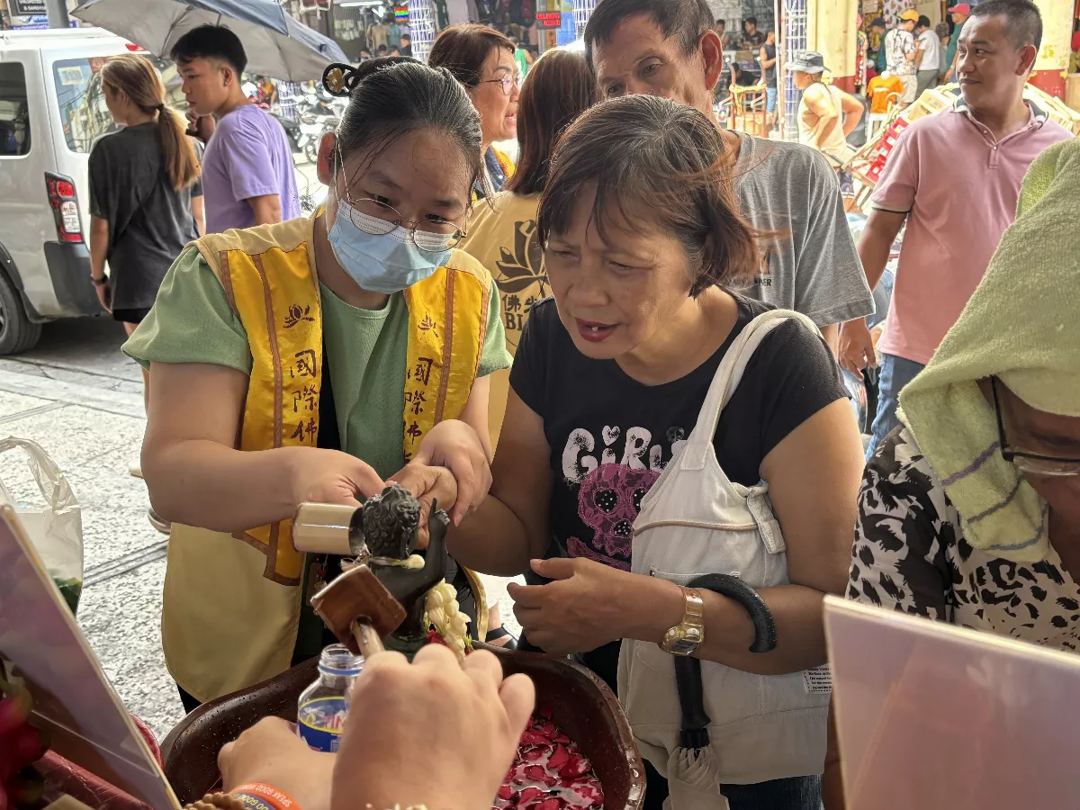 Buddha Bathing Event in Quiapo, Manila, Philippines Draws Thousands, Locally Supported by Enthusiastic Businesses