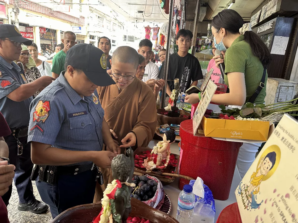 Buddha Bathing Event in Quiapo, Manila, Philippines Draws Thousands, Locally Supported by Enthusiastic Businesses
