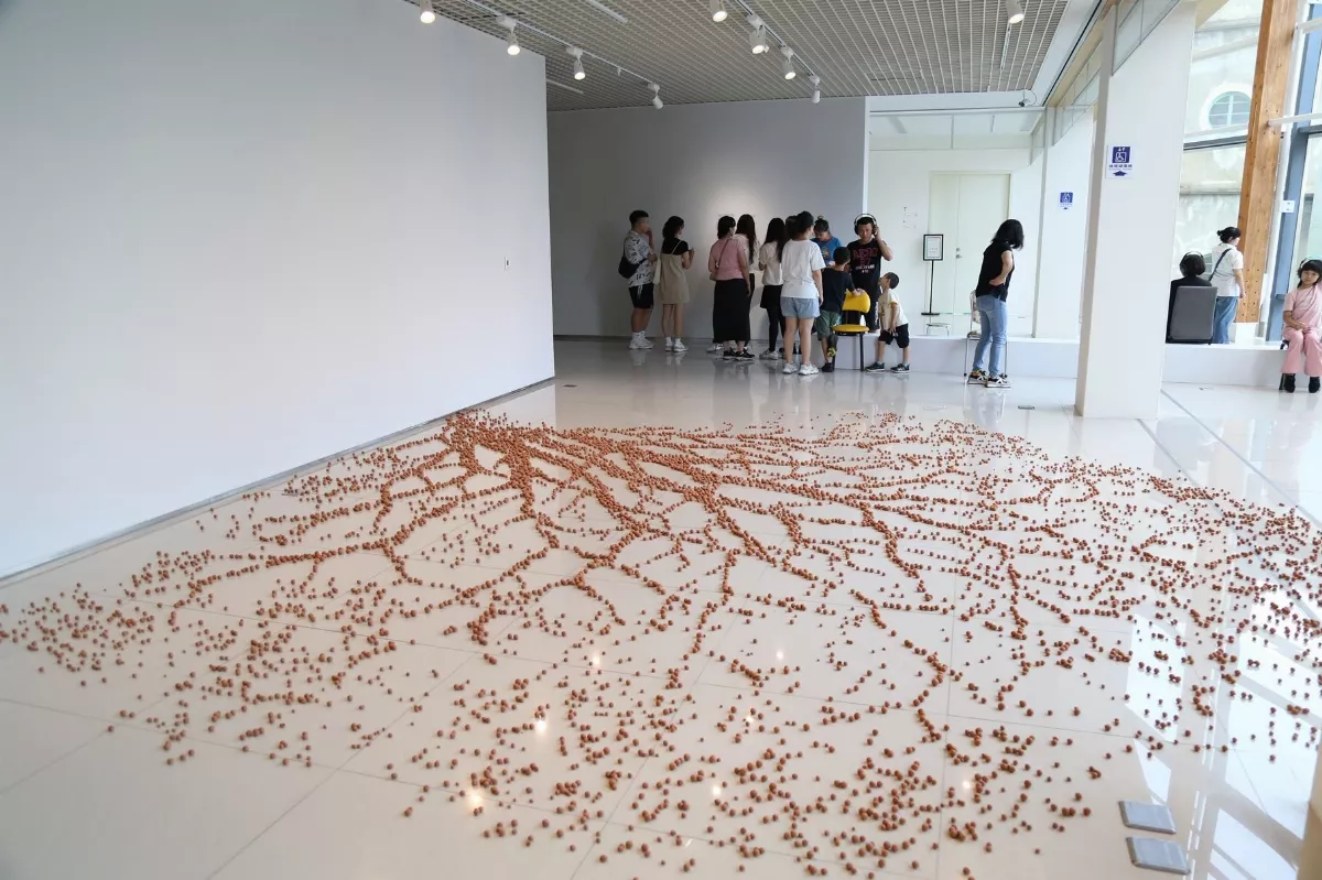 嘉美館廣場搭溫室 展出越南移民花園