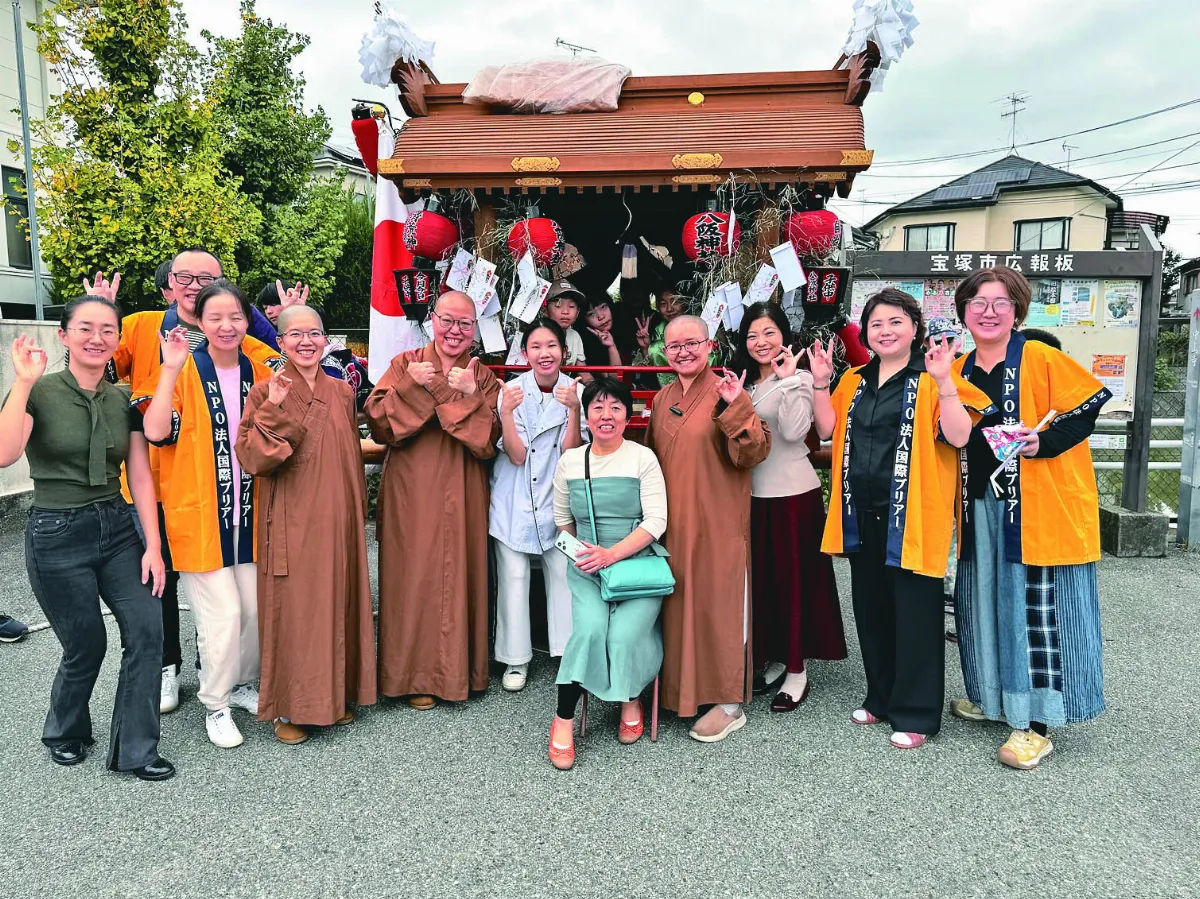 大阪佛光人走入社區  結緣清荒神地車祭